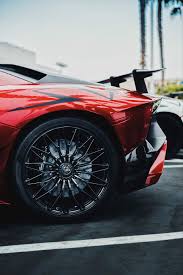 Follow the vibe and change your wallpaper every day! Hd Wallpaper Black And Red Lamborghini Aventador Sv Rear Left Side Red Car With Spoiler Wallpaper Flare