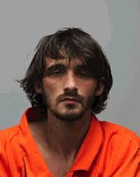 Man charged with shooting another in Bradley County parking lot