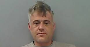 Domestic violence victim 'lay curled up