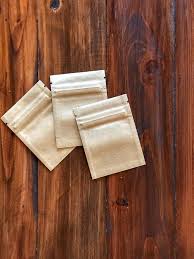 There is mosaic build into it. 3 Kraft Paper Zipper Lock Bag On The Vintage Wooden Table Stock Photo Image Of Object 100g 114758580