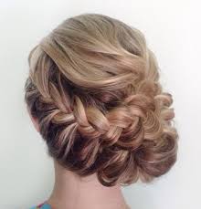 A low updo will make your jawline appear slender and draws attention to your cheekbones. Side Braided Low Updo Wedding Hairstyle