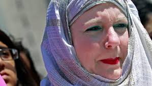 Community members gather during a peace rally for Gaza