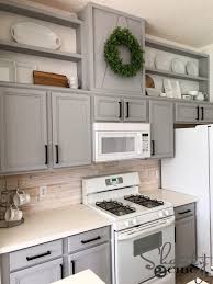 Diy backsplashes tend to be lightweight and made of materials that are easier to apply than the usual ceramic or glass. Diy Driftwood Backsplash An Affordable Backsplash Upgrade Shanty 2 Chic