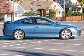 Image result for Arrival Blue 2004 Pontiac