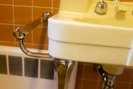 attach to bathroom sink legs