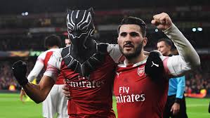 The arsenal striker pulling the mask over his head after bagging against rennes on thursday. Aubameyang I Needed A Mask That Represented Me Interview News Arsenal Com