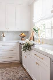 Painting kitchen cabinets is great for a budget update, but not everyone relishes doing it, and for good reason. White Kitchen Refresh Haven By Design