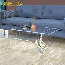 The table is entirely made of acrylic as their material of choice and the funny part about it are the side part and interior pockets of the tables, where you can place all the magazines you have available. Waterfall Acrylic Coffee Table With Additional Shelf Lucite Living Room Tea Table With Magazine Rack Coffee Tables Aliexpress