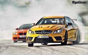 Mercedes Benz C63 Amg Yellow And Bmw M3 Gts Red Supercar Wallpaper 1920x1200 Resolution Wallpaper Download Bmw M3 Mercedes Black Mercedes Benz C63 Amg