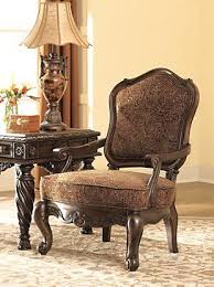 North Shore Accent Chair Ashley Furniture Homestore In 2020 Tuscan Furniture Tuscan Living Rooms Accent Chairs