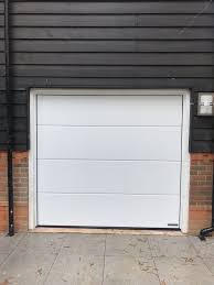 Hormann Sectional Garage Door White Berkhamstead Swr Redefining Homes Garage Door Installation Sectional Garage Doors Garage Doors
