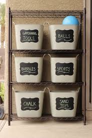 14 Genius Ideas That Will Make Your Backyard The Best Place To Hang Out Outdoor Toy Storage Diy Outdoor Toys Garage Organization