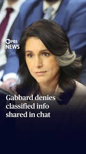 Sen. Mark Warner, D-Va., and Director of National Intelligence Tulsi  Gabbard clashed Tuesday over whether an apparent group chat discussion of  plans for an attack