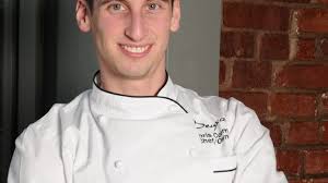 Chef Chris Coombs signs