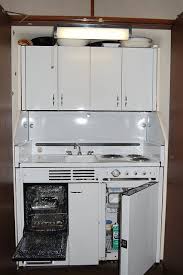 Accommodations sister bay door county whirlpool fireplace | coachlite inn. Dwyer Kitchenette Small Apartment Kitchen Small Kitchen Bar Tiny House Kitchen