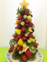 Imagine growing up to six different fruit on the same tree on your balcony! Fruit Christmas Tree Creative Christmas Food Food Displays Christmas Food