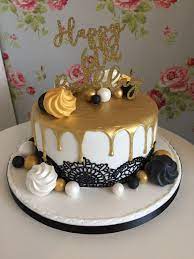 The most common gold cake sprinkles material is paper. Black White And Gold Drip Cake Black And Gold Birthday Cake Golden Birthday Cakes 60th Birthday Cakes