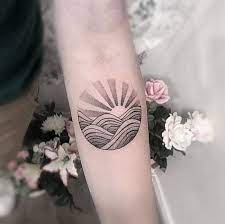 Sun Tattoo Design On The Inner Side Of The Arm In Japanese Style Japanese Style Tattoo Japanese Sun Tattoo Sun Tattoo