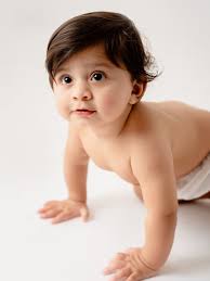 We believe less is infinitely more. Natural light, neutral tones, and your  baby in their purest form—no props, no distractions—only fleeting, timeless  innocence. These portraits aren't just for today—they'll resonate  beautifully for