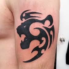 40 Tribal Lion Tattoo Designs For Men Mighty Feline Ink Ideas Tribal Lion Tattoo Tribal Lion Lion Tattoo Design