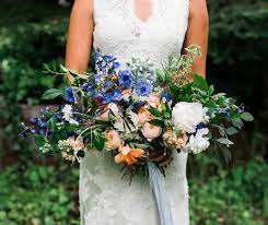 Maybe you would like to learn more about one of these? This Gorgeous Boho Wildflower Bridal Bouquet Features A Color Palette Of Peaches Creams Wildflower Wedding Bouquet Peach Wedding Flowers Wildflower Wedding