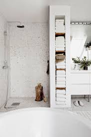 A compact space for the washer and dry is located in the bathroom. How To Double Your Storage In A Small Bathroom