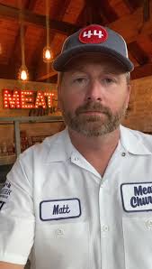 Cat visiting a grill