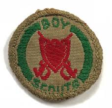 The badges around the edges of the quilt are the badges that he earned while a scout. Sally Bosleys Badge Shop Shop