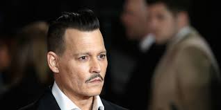 Johnny Depp sued for allegedly punching co-worker