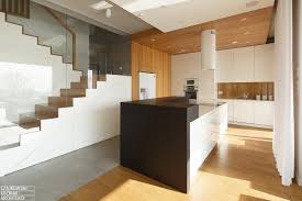Because light wood cabinets tend to be subdued, care must be taken during the design phase. Poland Modern Home Interior Black White Light Wood Color Scheme 1 Idesignarch Interior Design Architecture Interior Decorating Emagazine