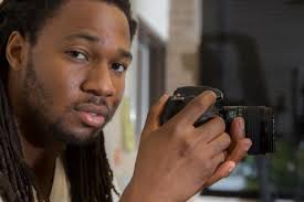 Behind Larry Cook's Lens