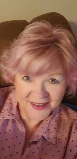 Hi all! I just wanted to introduce myself and share some photos I took. My  new hiking boots, ( had to get the pink ones off Amazon, LoL), me when I was