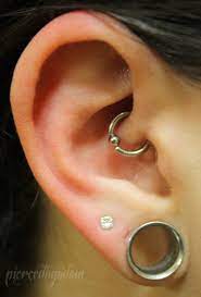 Pin By Maribel Nixon On Body Piercings Daith Piercing Baby Ear Piercing Plugs Earrings