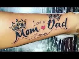 In this guide, we'll share the history of mom tattoos as well as some ideas for creating a beautiful mother tattoo to appreciate this special person. Mom Dad Tattoo Youtube Mom Dad Tattoos Mom Tattoo Designs Dad Tattoos