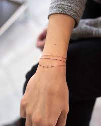 The tattoos lend a smart and trendy touch to your personality. 21 Bracelet Tattoo Ideas That Look Like Jewelry Stayglam