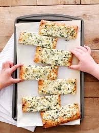 Easy recipe starts with refrigerated pizza dough for a quick holiday appetizer. Spinach Artichoke Dip Pizza For An Easy Weeknight Dinner Helloyummy
