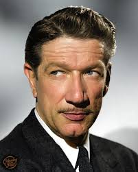 Who is the singing actor in the 1965 black and white film and what is the  name of the film?