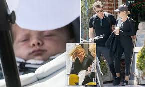 Lara Bingle and Sam Worthington's boy Rocket Zot seen for the first time