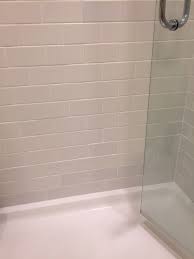 These problems allow shower water to penetrate the wall and cause damage, and they are generally found low on the shower wall, down where the tile meets the shower base. Why Are My Shower Tiles Becoming Discolored