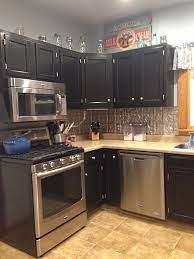 Kitchen Cabinets In Black Gel Stain Stained Kitchen Cabinets Staining Cabinets Kitchen Cabinets