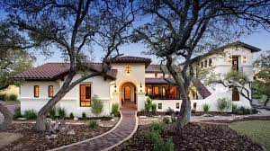 These models feature abundant glass, horizontal lines, stucco cladding, low tiled roofs. Spanish Hacienda Mediterranean Exterior Austin By Geschke Group Architecture Houzz