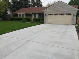 If you're replacing an old driveway with a new one, you'll need to budget for the existing driveway removal. Residential Concrete Driveways Photo Gallery Fortisgw Service Excellence In Concrete Asphalt And Brick Paving
