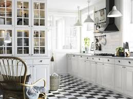 The pink lights from underneath the cabinets give a rosy hue to the room and the tiny vase of red roses on the table makes this kitchen the perfect place for a romantic dinner. Style Selector Finding The Best Ikea Kitchen Cabinet Doors For Your Style Apartment Therapy