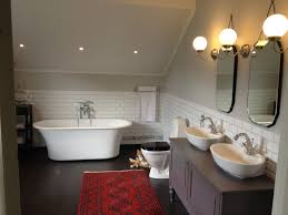 The clean lines and gleaming chrome of our art deco bathroom light fixtures are the perfect complement for almost any bathroom. Creating A Vintage Bathroom Lighting Design Certified Lighting Com