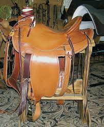 The tree bars have contact with the horse and are designed to distribute rider's weight evenly over the horse's back. Western Saddle