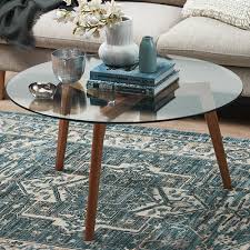 The table has a sunken center that allows for display storage. Temple Webster Stad Glass Top Coffee Table Reviews