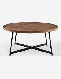 Custommade walnut and black walnut coffee tables are handcrafted by expert craftsmen. Gweneth Round Coffee Table Walnut