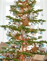 A glass ornament with shells, moss, net and some burlap on top is a gorgeous idea for a beachy christmas. Beach Christmas Decorations Ideas Inspired By Sea Sand Shells Beach Bliss Living