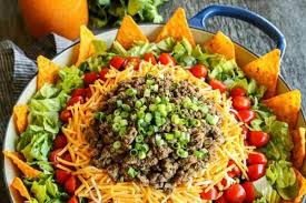 It's easy to make and full of yummy veggies, beans, beef and cheese, crushed doritos are mixed in and then it's topped with a tangy italian dressing. Dorito Taco Salad With Creamy Taco Dressing A Farmgirl S Dabbles