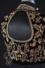 Black And Gold Combination Blouse Designs Turtle Neck Style Black Blouse With Gold Design All Over Is Beautiful And A Fantastic Elegant Bridal Look Indian Blouse Designs Fashion Blouse Design Models
